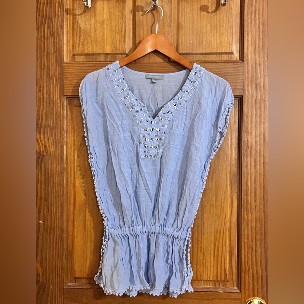 Cute light blue top with beads and Pompom detail, stretchy waistline XS-S